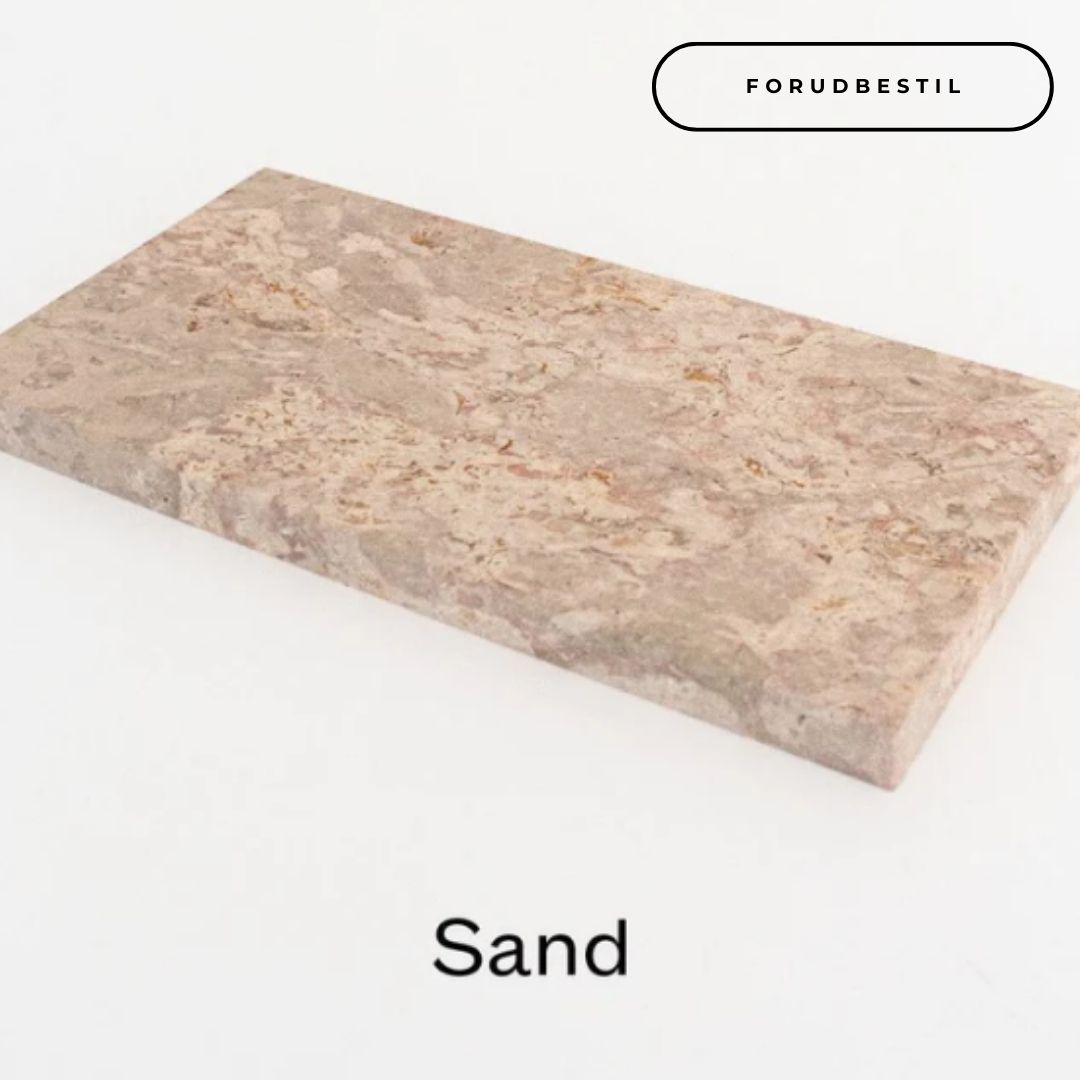 Marmorbakke i sand
