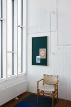 Opslagstavle i mørkegrøn på væg