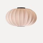 Rund loftlampe i sandfarvet med sorte detalje